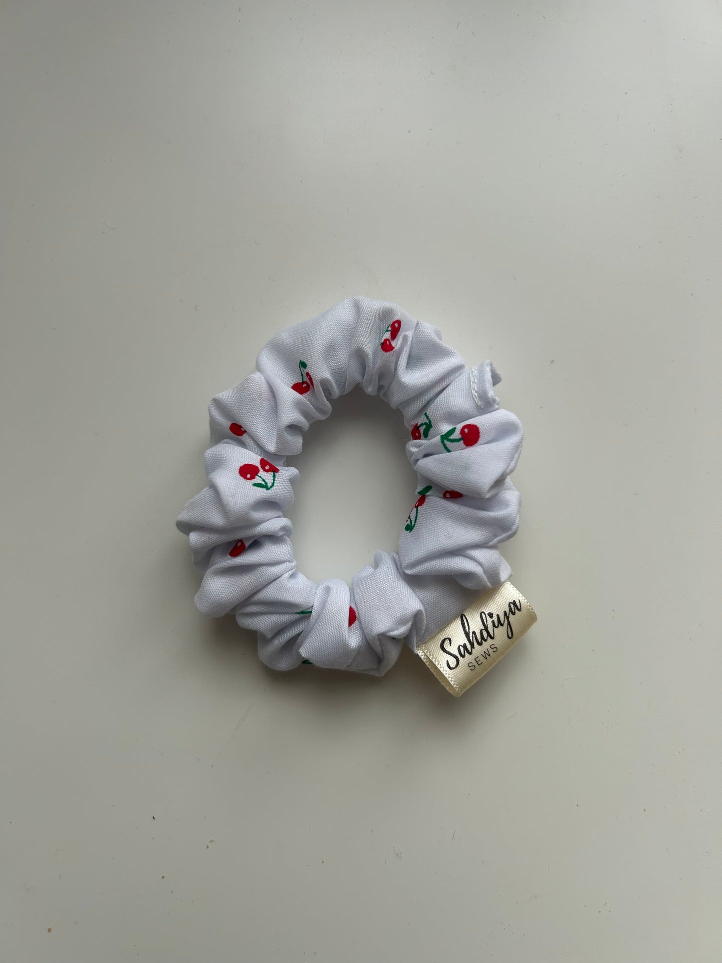 XS cherry scrunchie