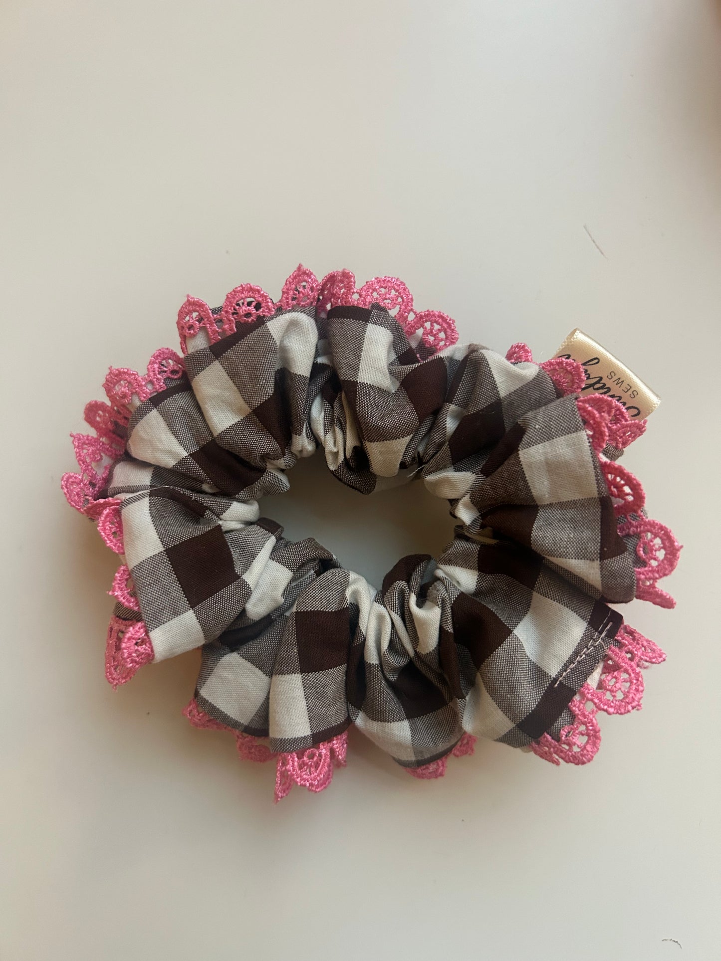 Brown gingham with pink lace