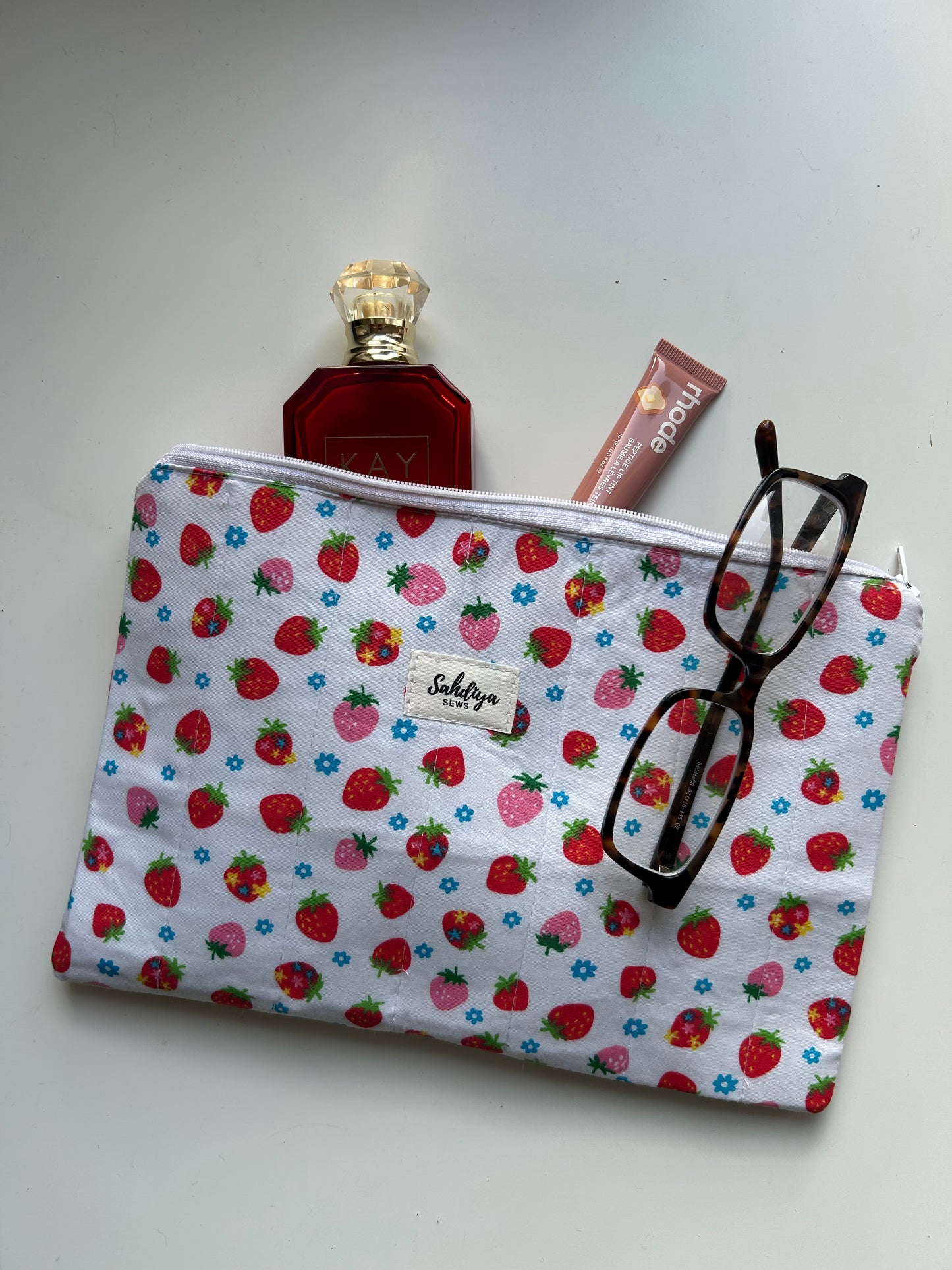 Quilted flat zipper pouch | Strawberry makeup bag | Cosmetics pouch | Travel must haves