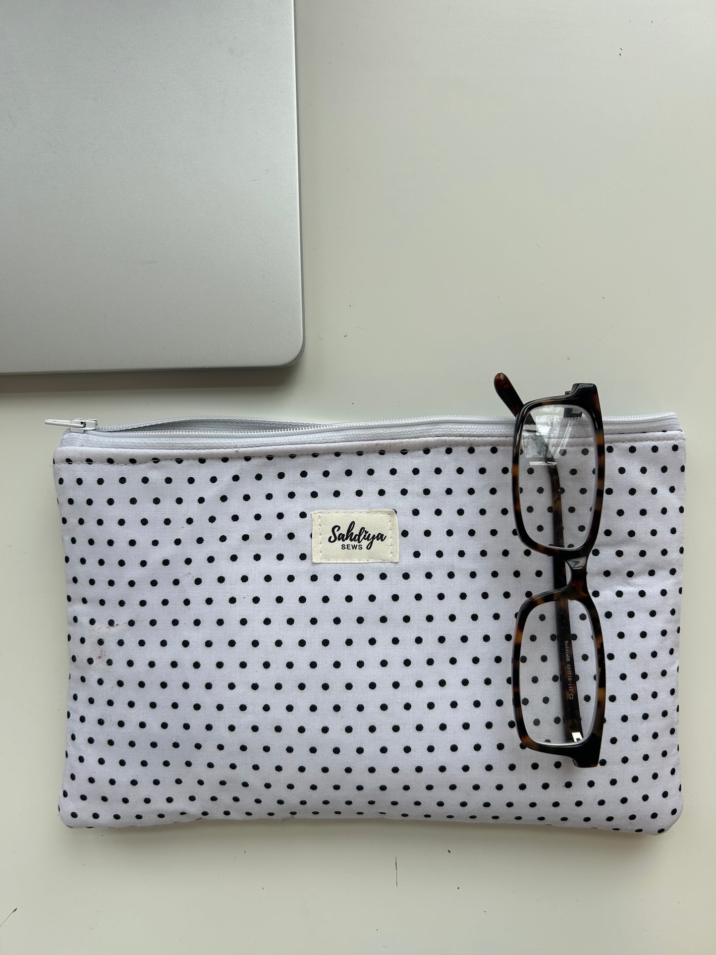 Polka dot quilted makeup pouch | White & black cosmetic bag | Everyday essentials organiser | Travel beauty pouch